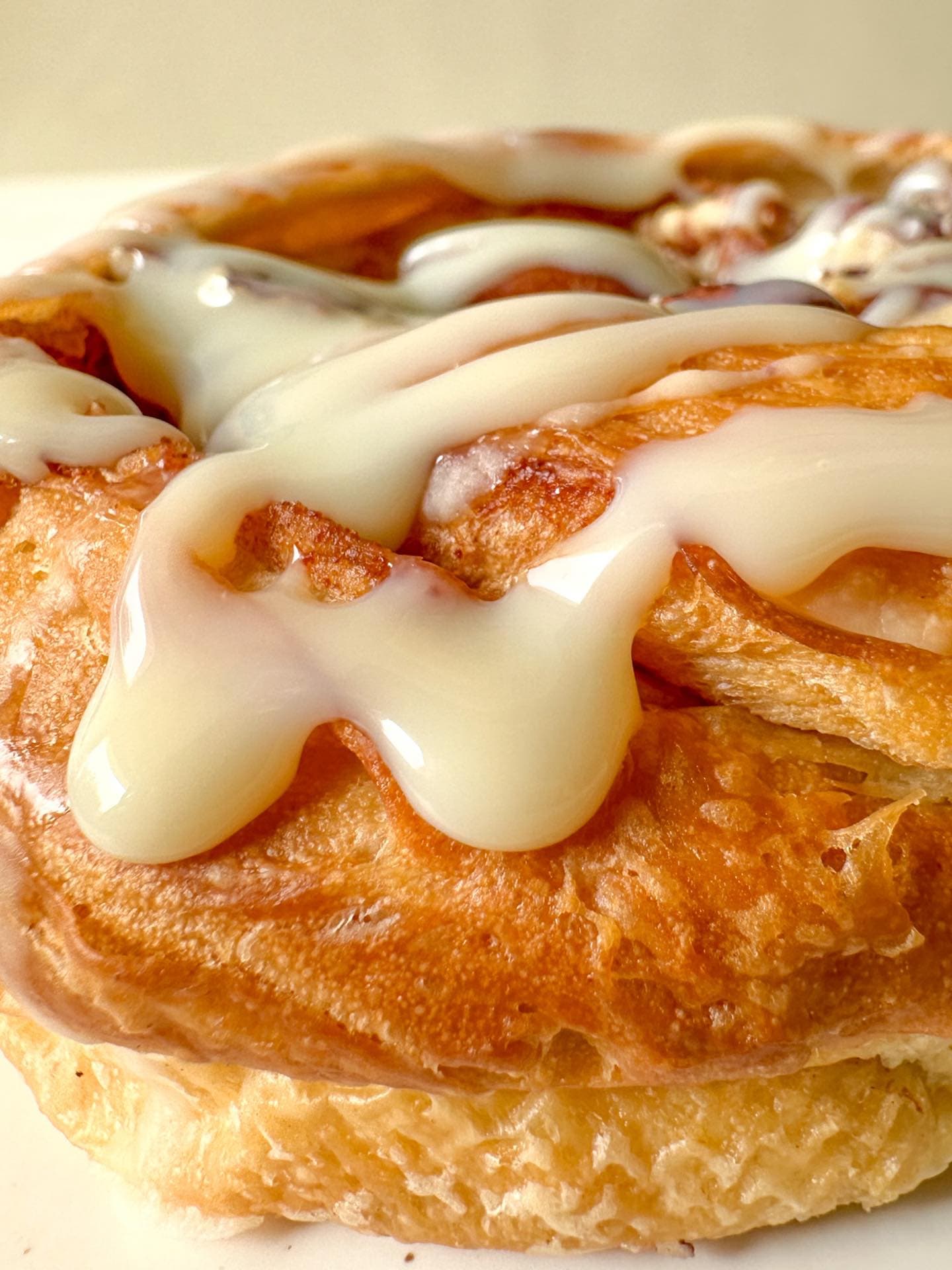 Cinnamon Danish, glazed, macro close-up